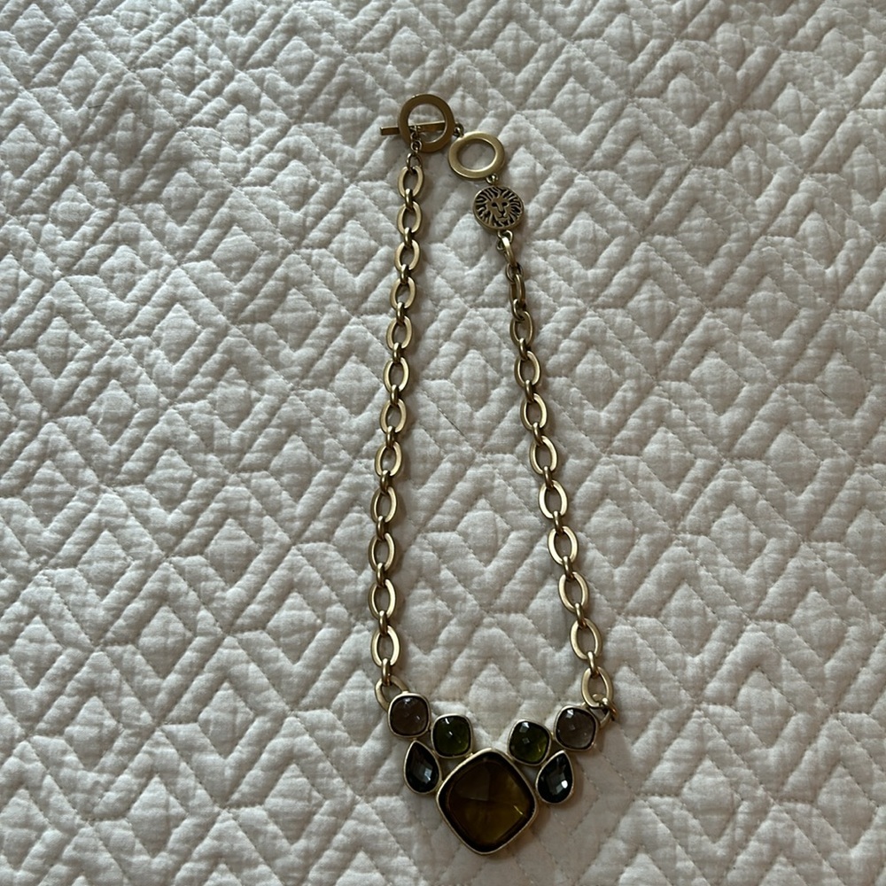 Anne Klein gold tone link necklace with muted gray, blue and green stones. - Picture 2 of 4